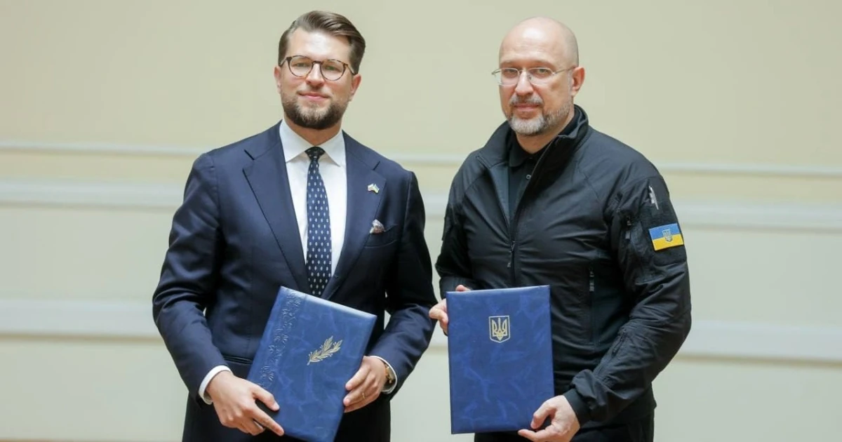 Денис Шмигаль і Лукас Савіцкас під час підписання енергетичної декларації